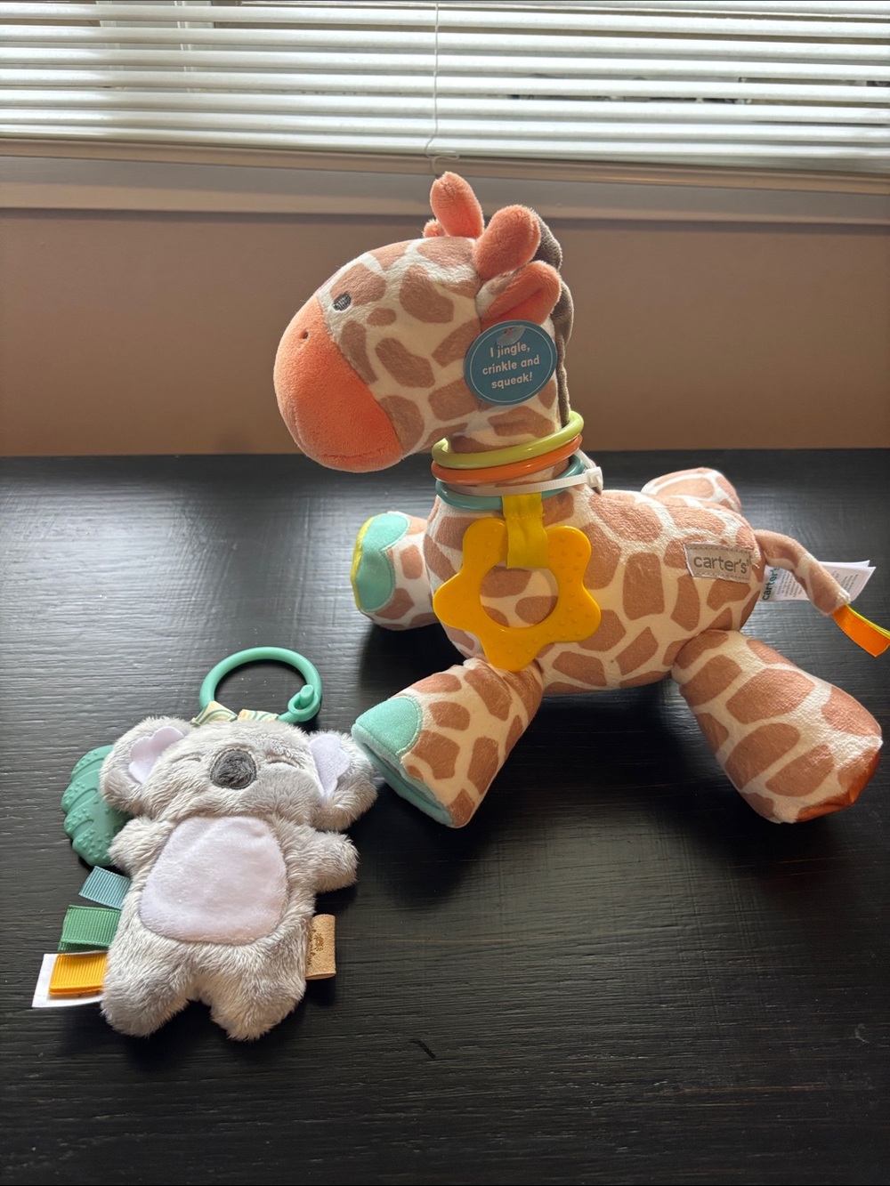 Carter's Orange and Cream Giraffe Sensory Plush with Teething Rings